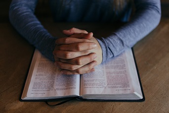 reading Bible and praying